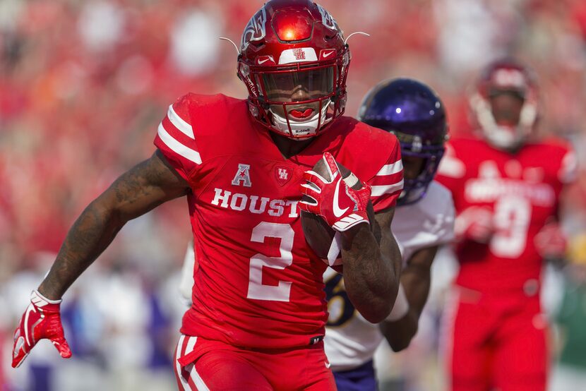 HOUSTON, TX - NOVEMBER 04:  Duke Catalon #2 of the Houston Cougars rushes for a touchdown in...