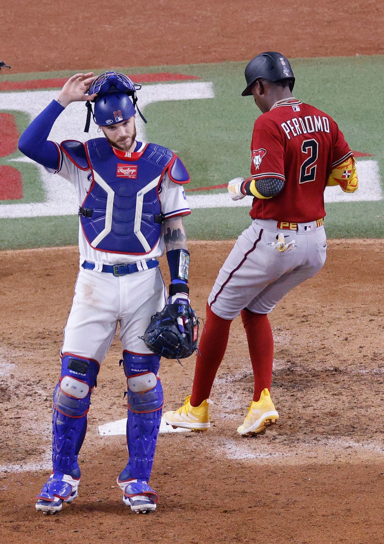 Arizona Diamondbacks shortstop Geraldo Perdomo (2) scores on a double hit by Arizona...