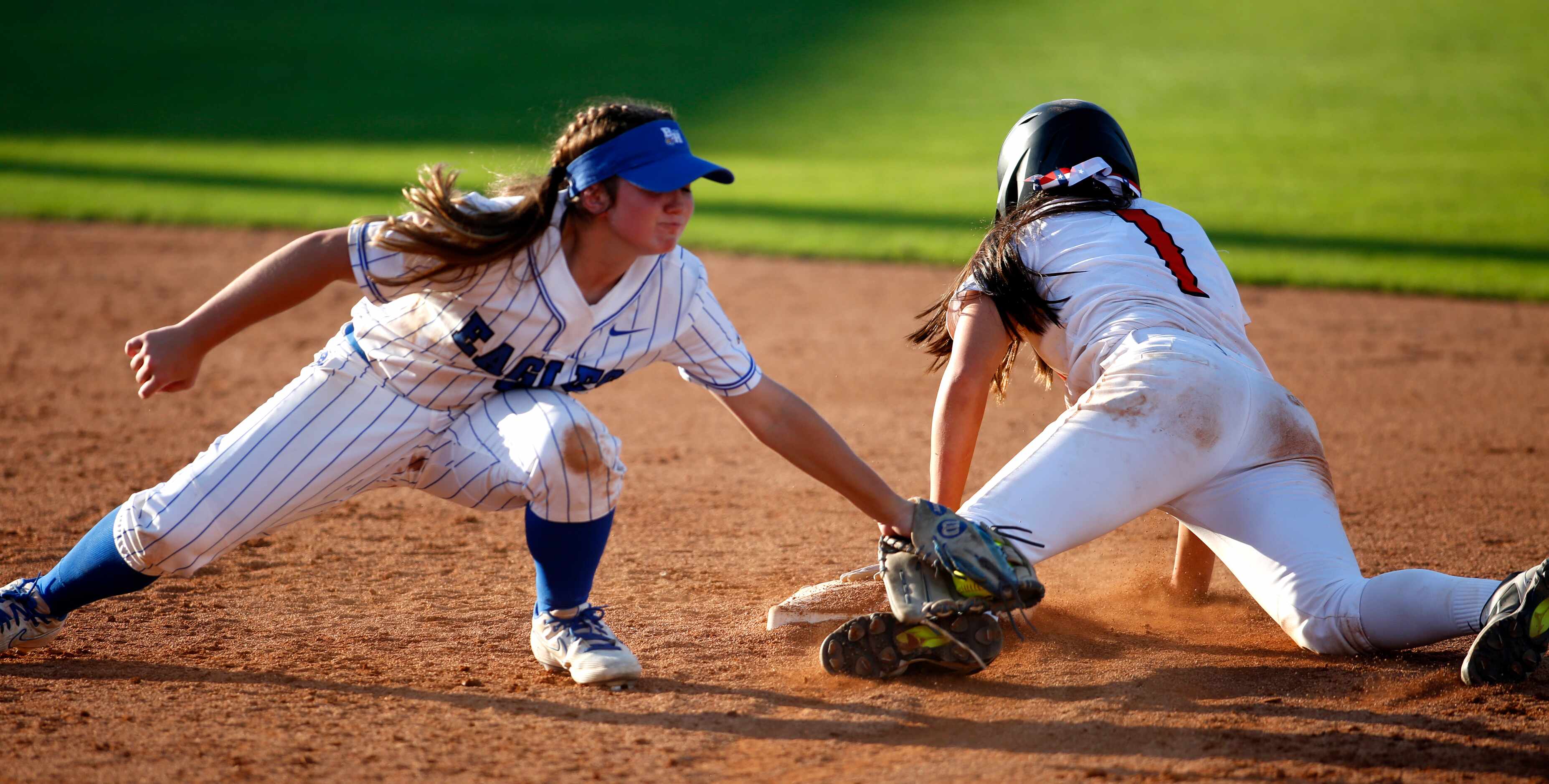 Aledo baserunner Macy Graf (1) steals 2nd base ahead of the tag of Barbers Hill shortstop...