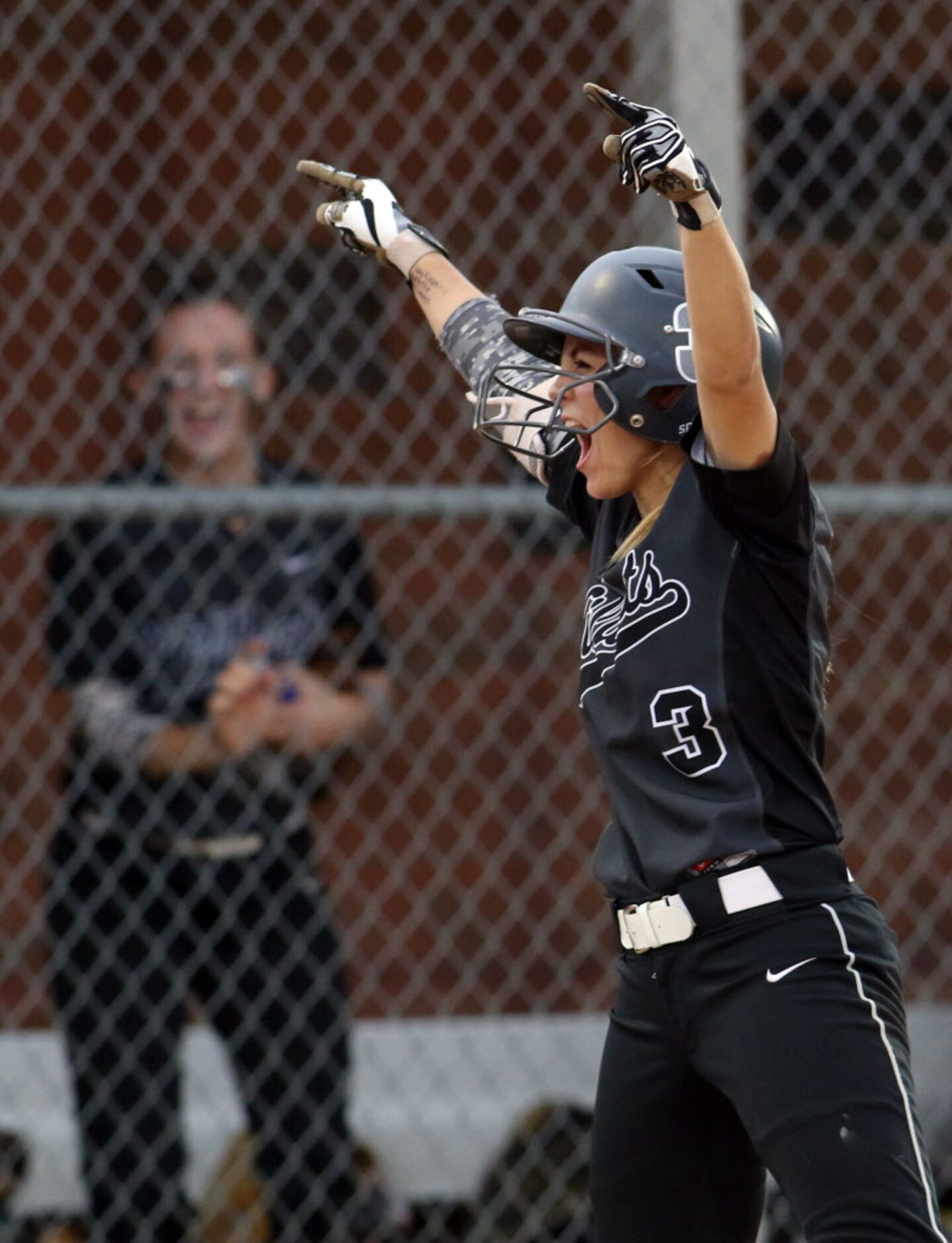 Denton Guyer outfielder Hannah Hodapp (3) celebrates her multi-RBI triple during the top of...