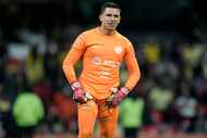 America's goalkeeper Luis Malagon gestures during a Mexican soccer league match against...