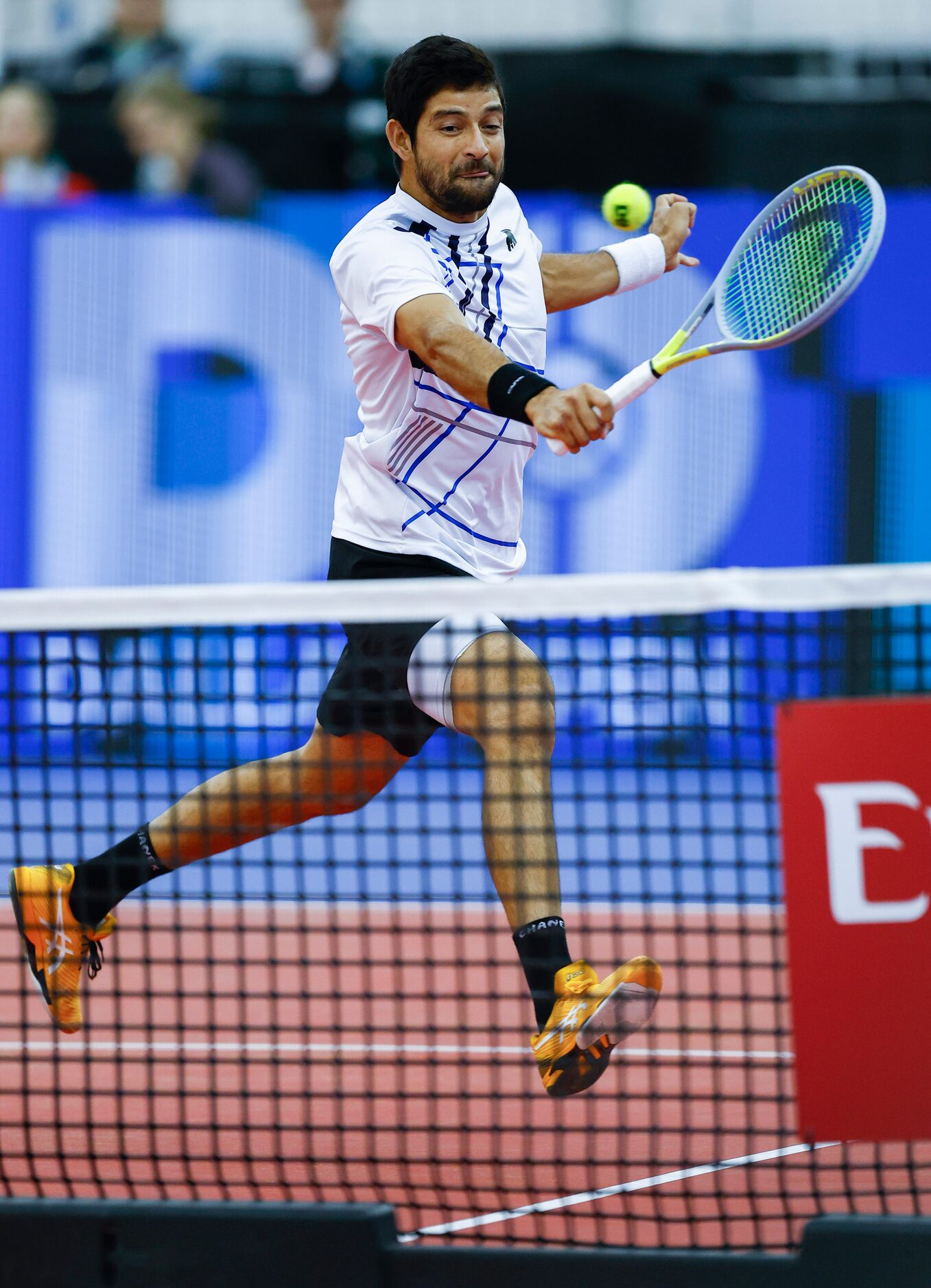 Marcelo Arevalo returns the ball during the doubles final of the ATP Dallas Open against...