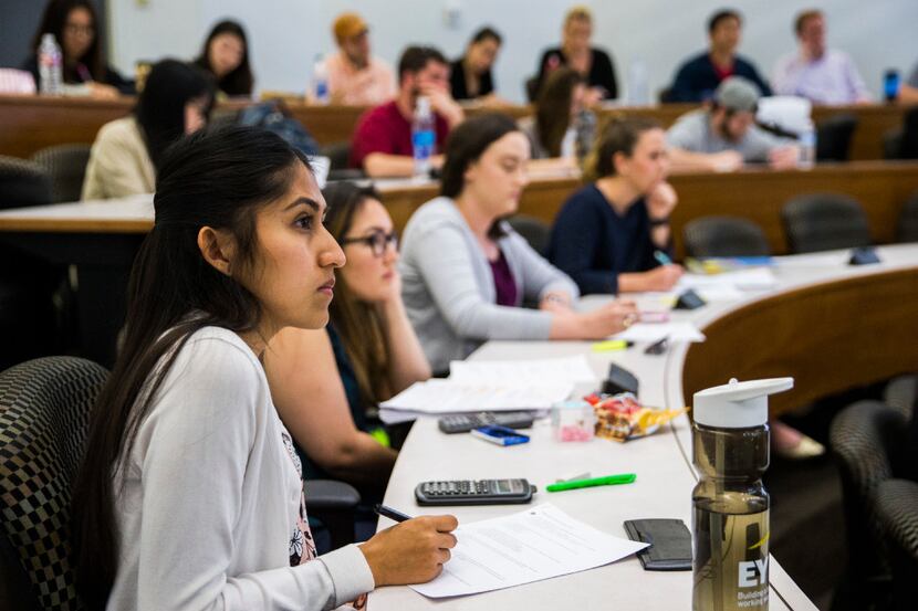Students listen during an accounting class at Southern Methodist University's Cox School of...
