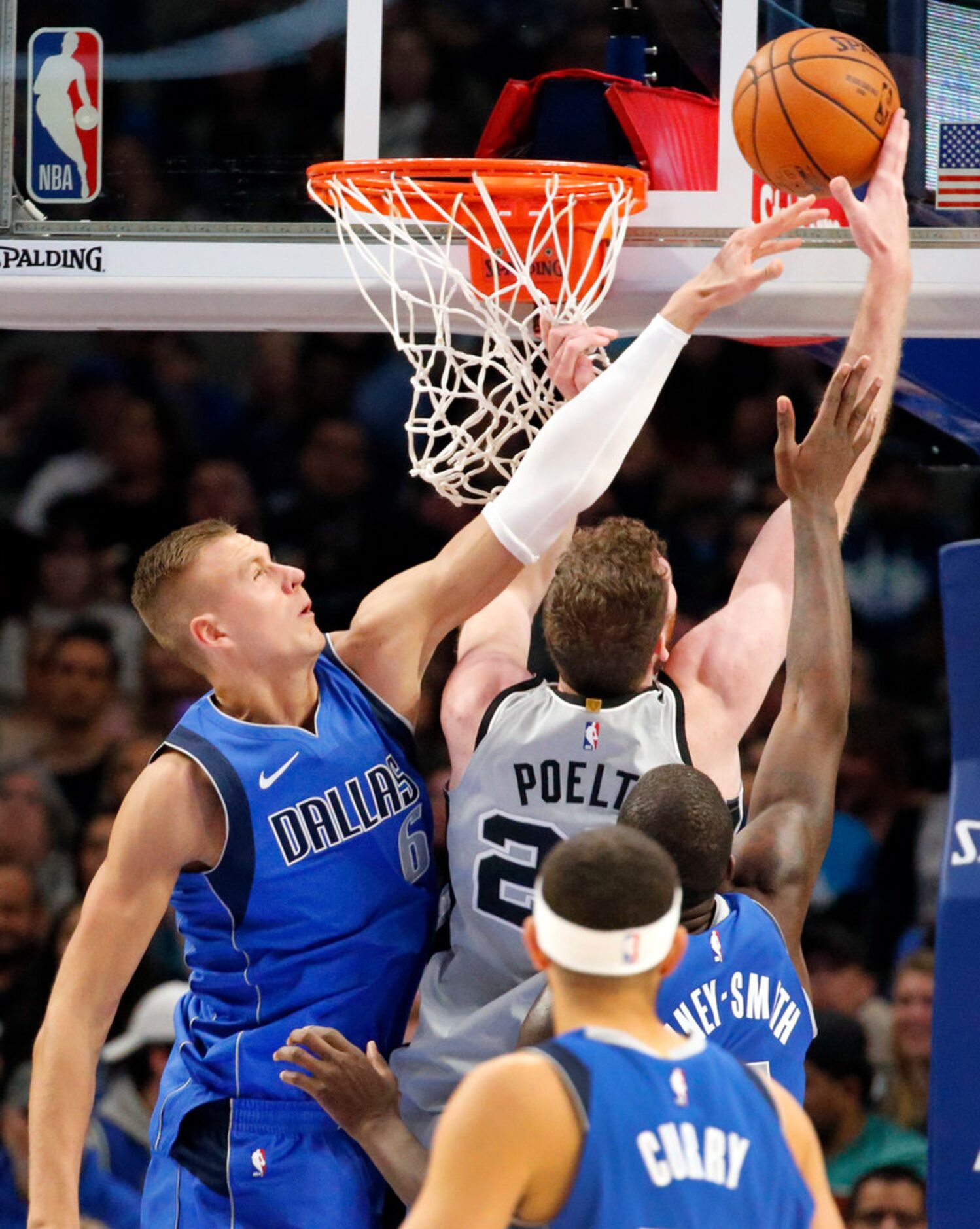 Dallas Mavericks forward Kristaps Porzingis (6) attempts to block San Antonio Spurs center...