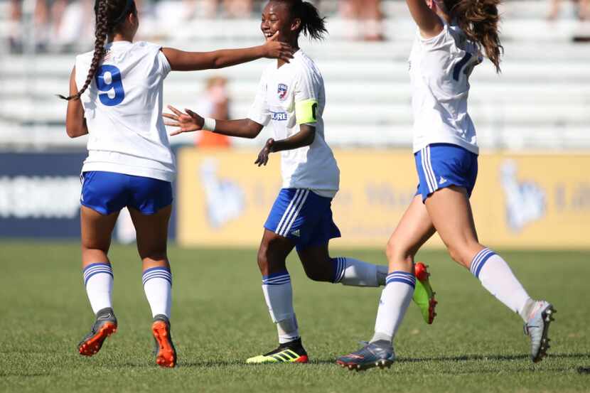 Jaedyn Shaw of FC Dallas (captain's armband) celebrates her opening goal in the U15 Girls...