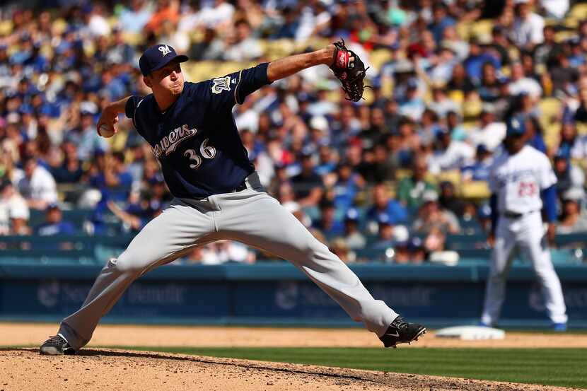 LOS ANGELES, CALIFORNIA - APRIL 14: Jake Petricka #36 of the Milwaukee Brewers throws a...