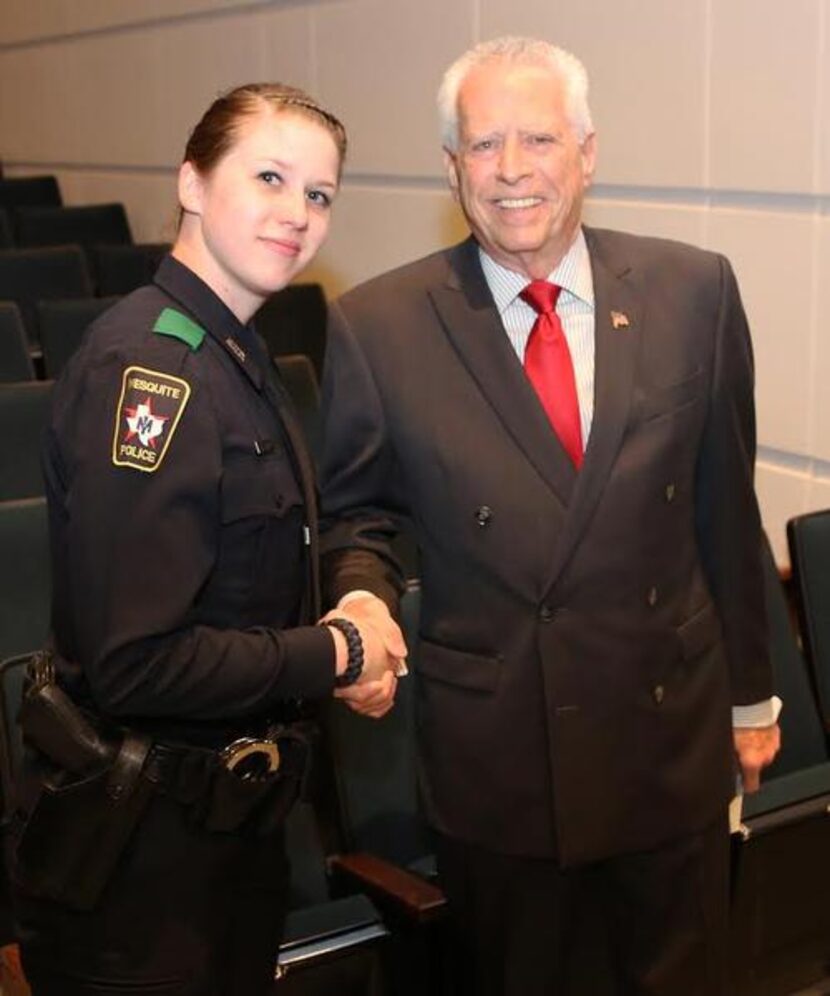 Mayor of Mesquite John Monaco (right) congratulates Nicole Shire on March 7 the Mesquite...