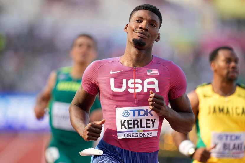 Fred Kerley, of the United States, wins a heat in the men's 200-meter run at the World...