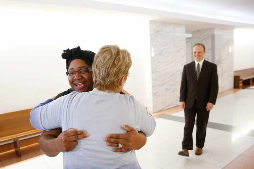 Stacey Jackson got a hug Thursday after a civil jury found Beamers bar partially liable for...