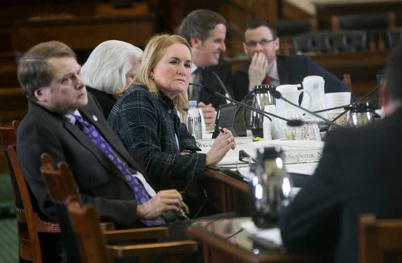 Sen. Sylvia Garcia, D-Houston, listens to people testify on the issue at the Texas Capitol.