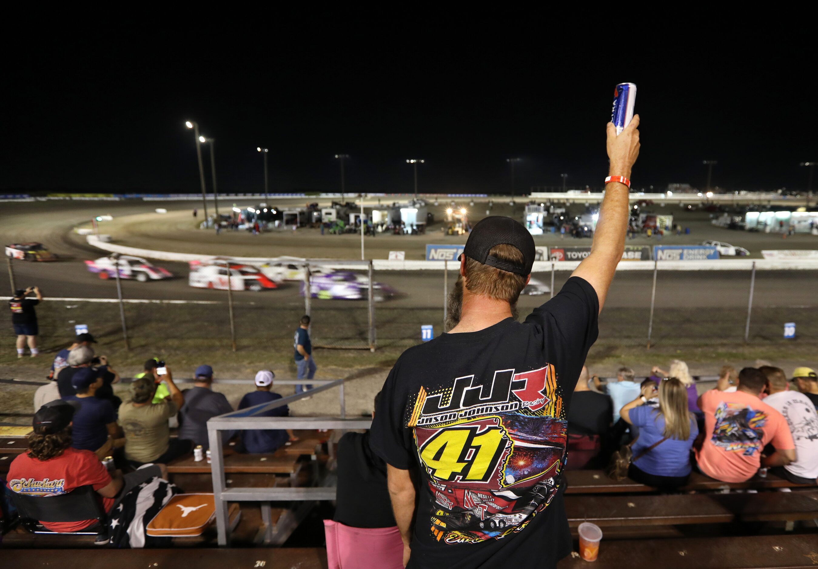 Billy Rhodes cheers on racers at Devil's Bowl Speedway. (Jason Janik/Special Contributor)