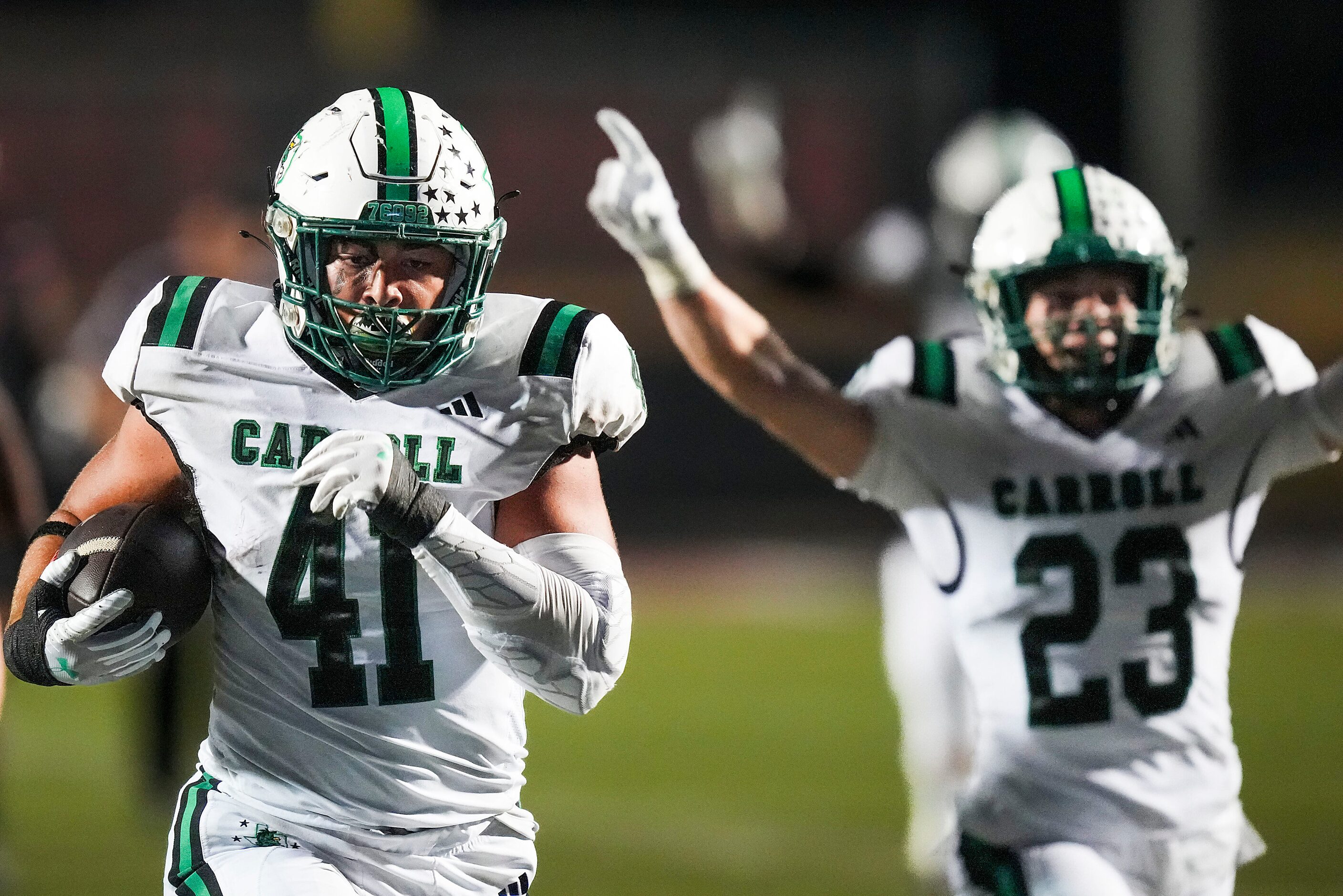 Southlake Carroll defensive lineman Wyatt Duffy (41) returns a fumble 46 yards for a...