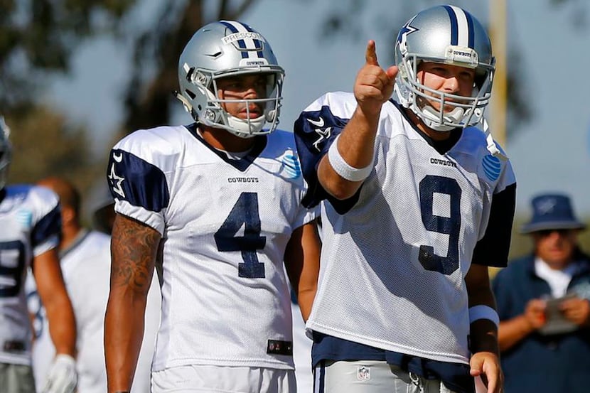 Dallas Cowboys quarterbacks Tony Romo (9) and quarterback Dak Prescott (4) are pictured...