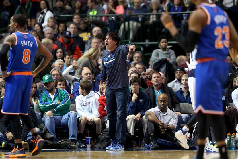Dallas Mavericks owner Mark Cuban questions a call in the second half of NBA Basketball...