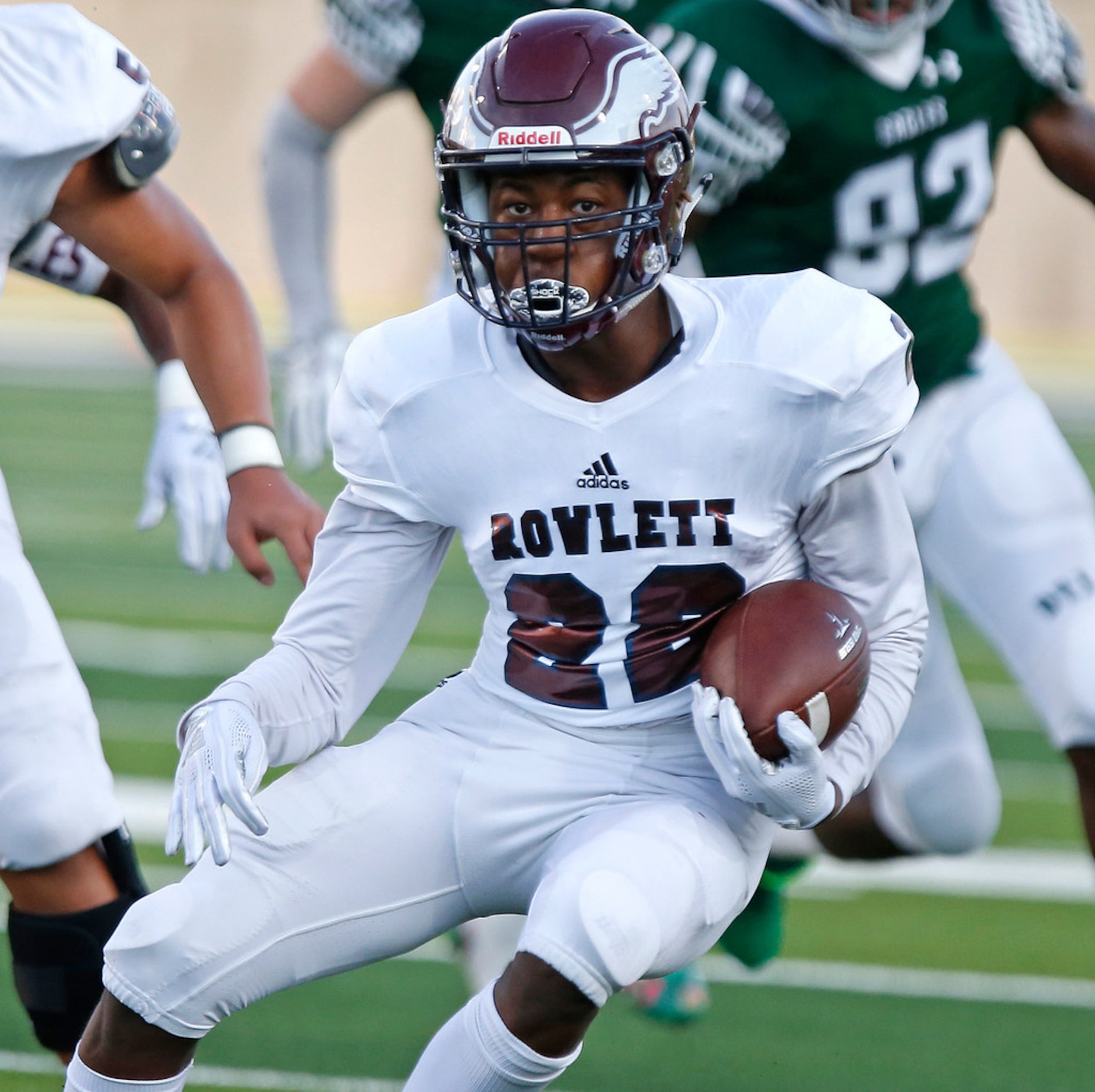 Rowlett High School running back Dwonyae Newton (22) carries the ball during the first half...