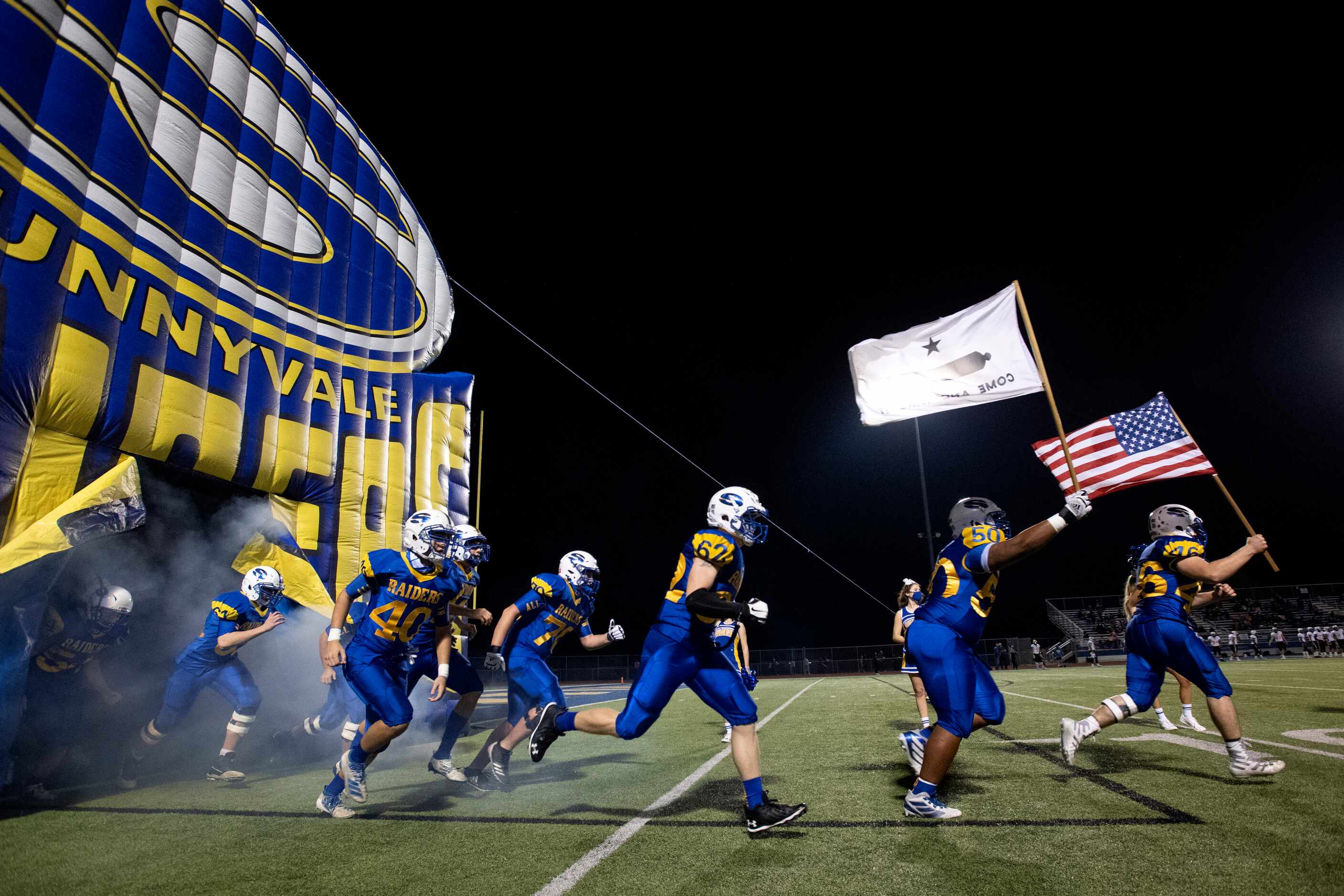 The Sunnyvale Raiders take the field before a high school football game against Ferris on...