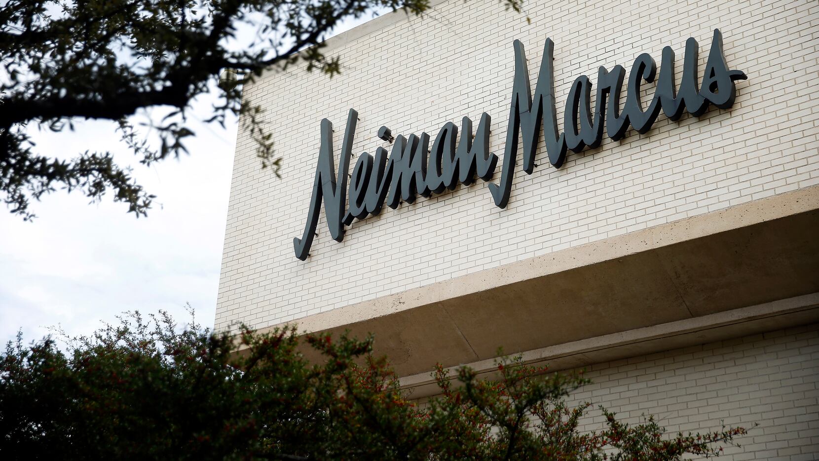 Neiman Marcus sign on the Dallas retailer's new Cityplace HQ is a traffic  stopper