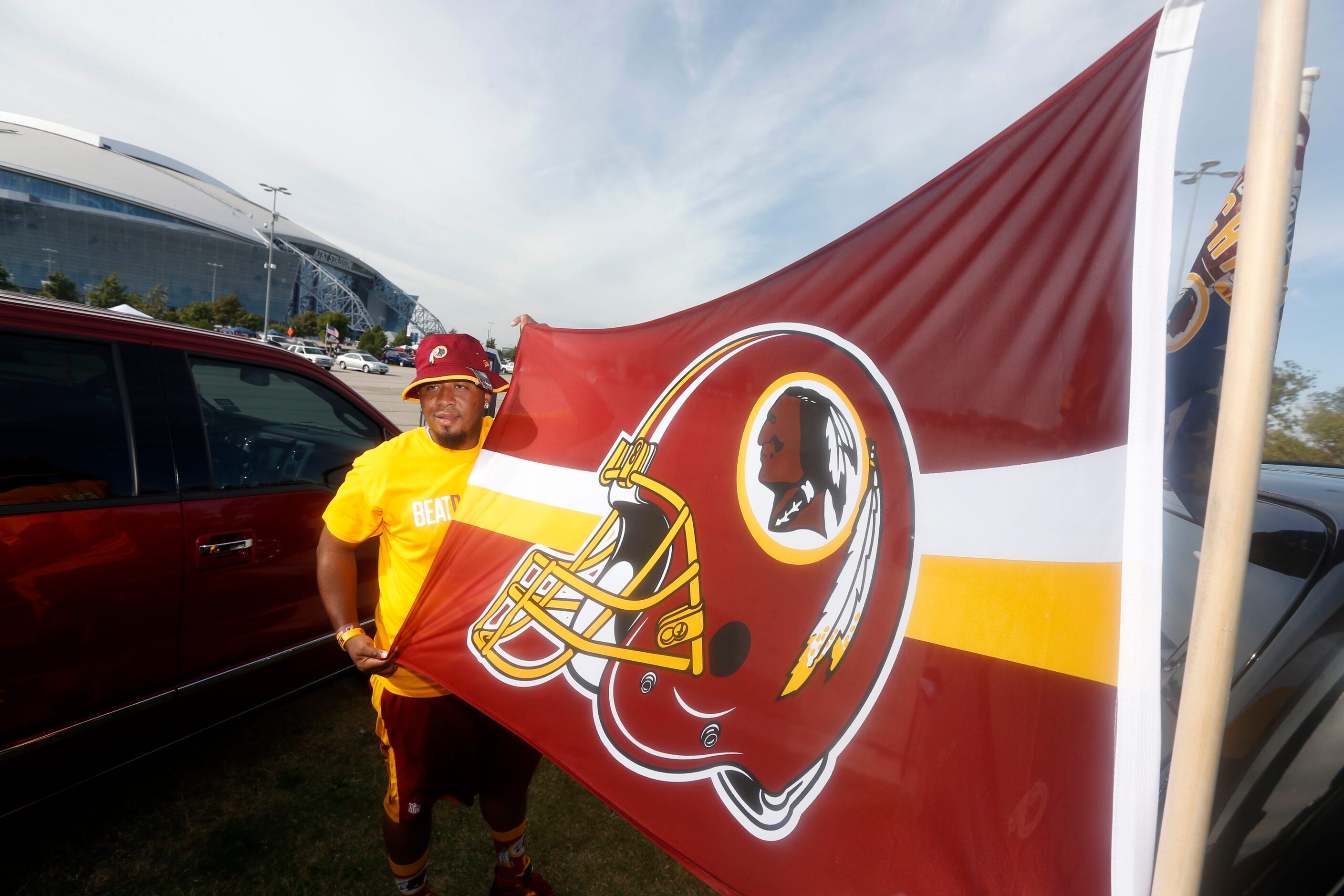 Coy Lewis of Temple displays his Washington Redskins flag prior to the Dallas...