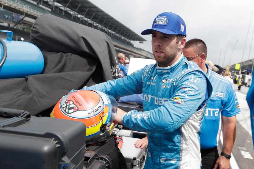 Ed Jones stows his helmet after he qualified for the IndyCar Indianapolis 500 auto race at...