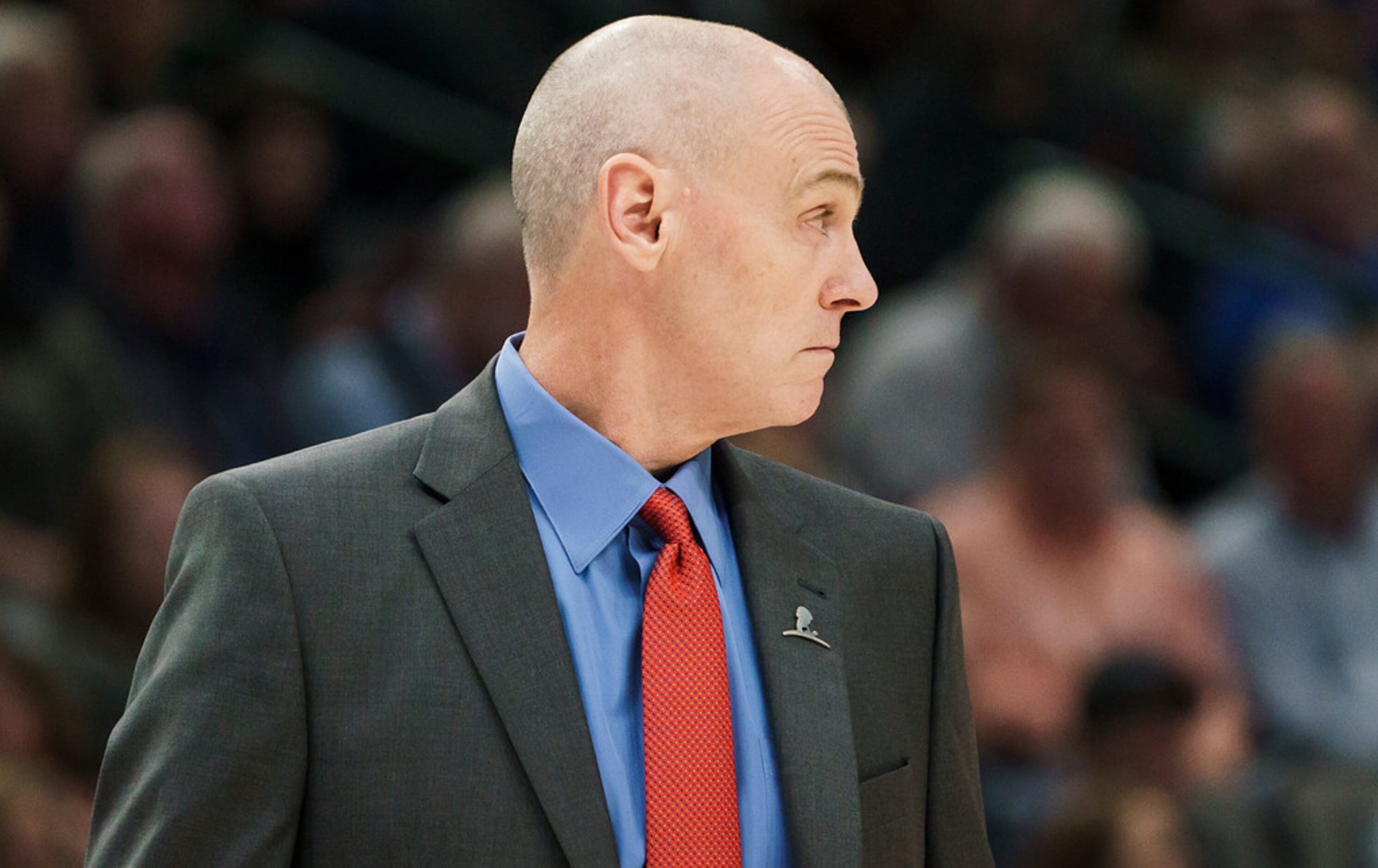 Dallas Mavericks head coach Rick Carlisle watches from the bench during the first half of an...