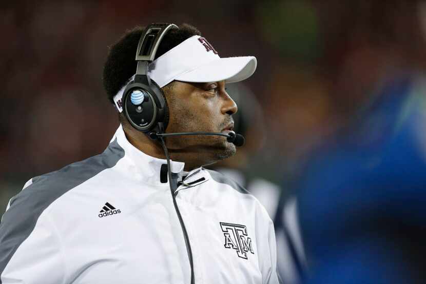 Texas A&M head coach Kevin Sumlin watches the action in the first  half of the Music City...