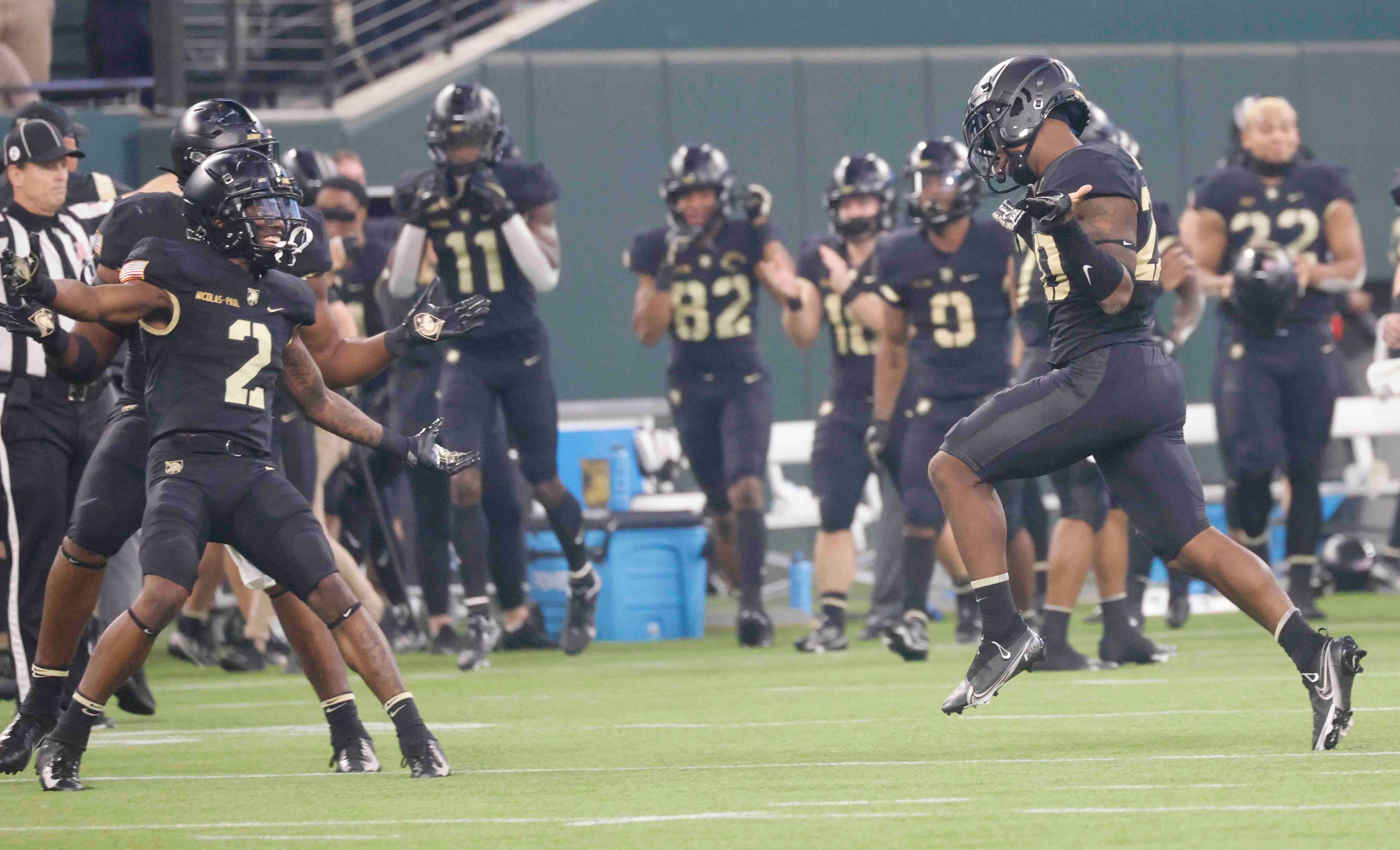 Army players celebrate an interception against Air Force during the first half of an NCAA...