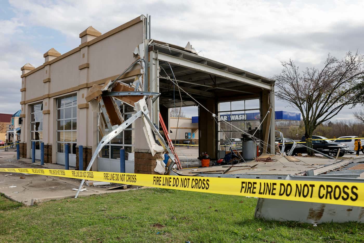 Storm damage from a possible tornado is seen at Mustang Elite Car Wash & Lube Center on Ira...