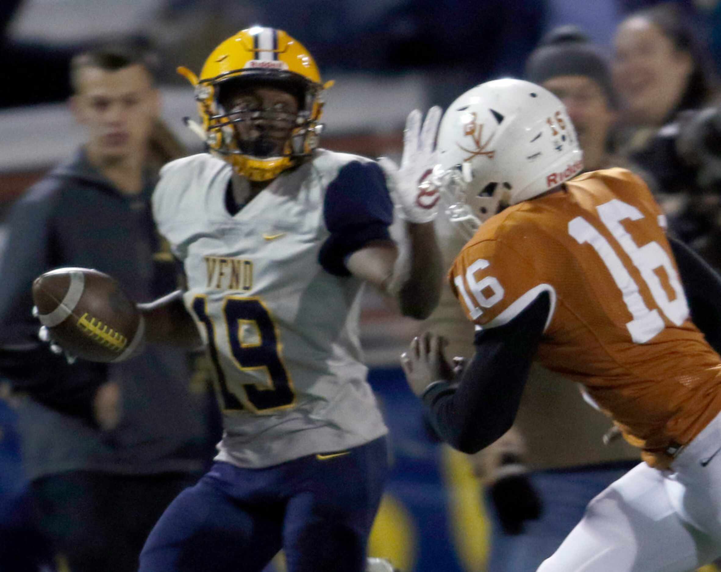 Arlington Lamar receiver Trevor West (19) looks to fend off the defensive pursuit of...