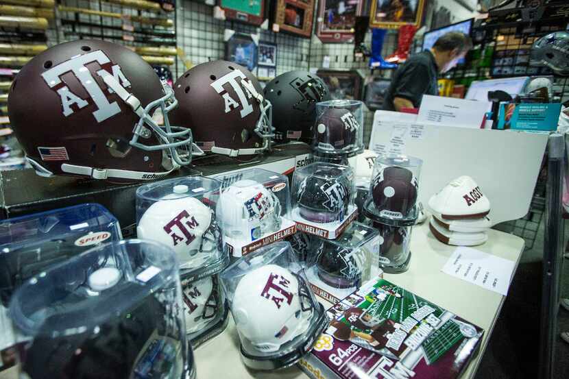 Texas A&M merchandise for sale fills a counter near the register of the store as former...
