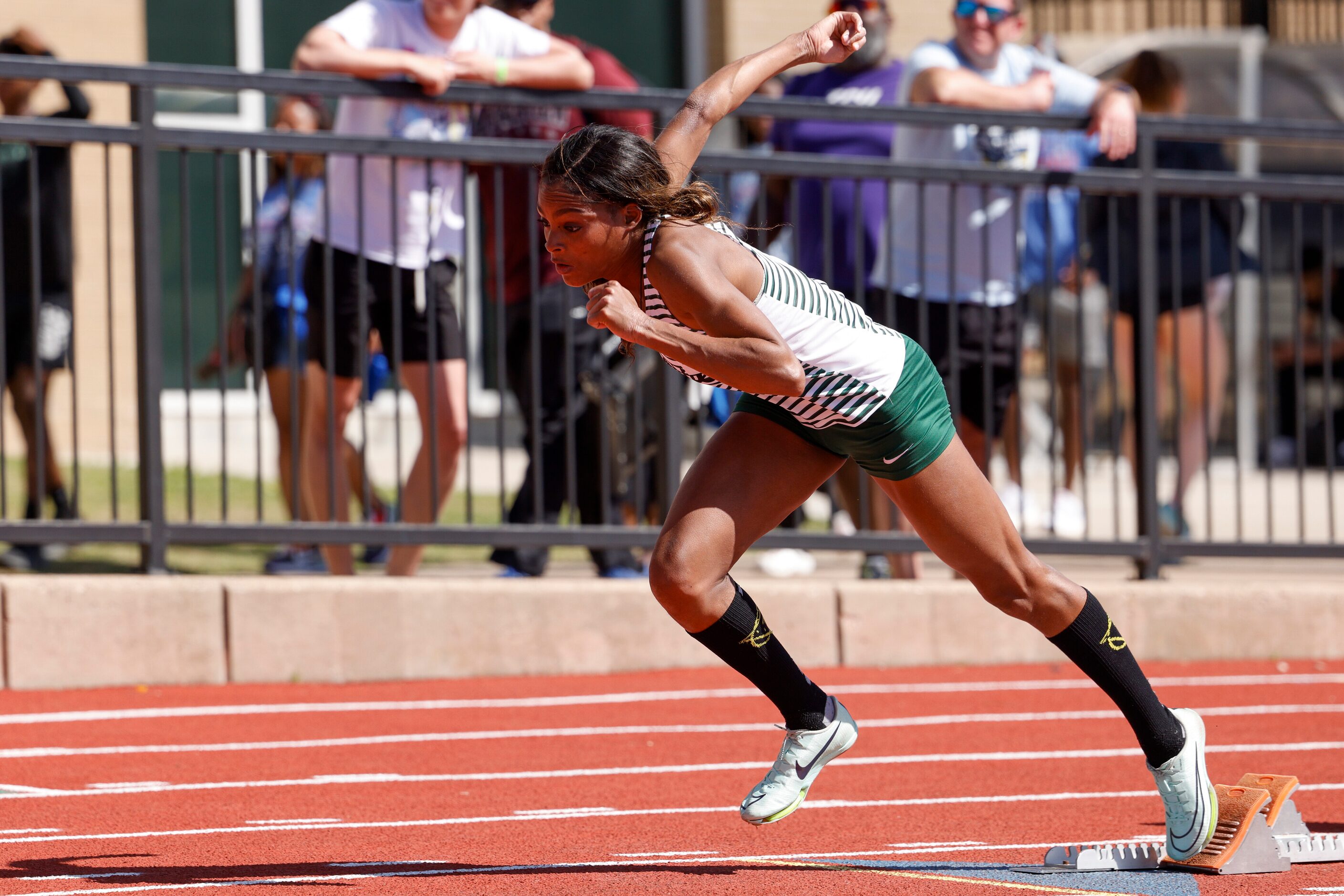 Prosper’s Lauren Lewis starts the 400 meter dash during the Jesuit-Sheaner Relays at Jesuit...