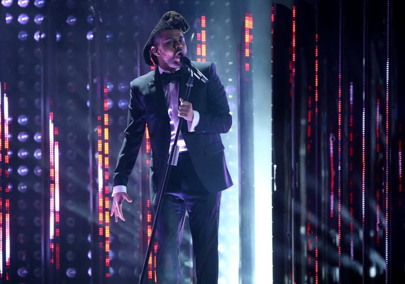 The Weeknd performs at the 58th annual Grammy Awards on Monday, Feb. 15, 2016, in Los...