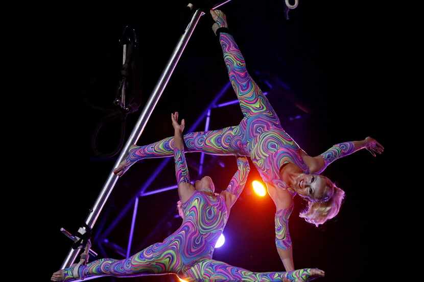 Lyric (top) and her mother Rietta Wallenda perform on the aerial perch with Cirque Musica at...