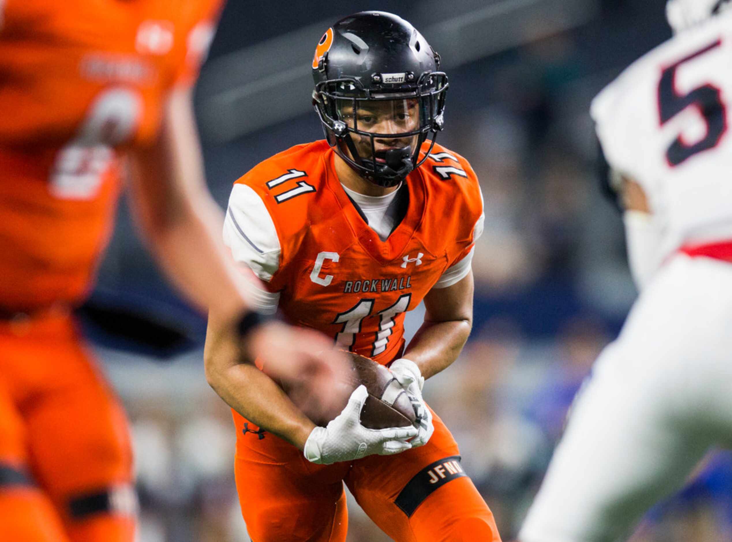 Rockwall wide receiver Jaxon Smith-Njigba (11) looks for an opening during the third quarter...