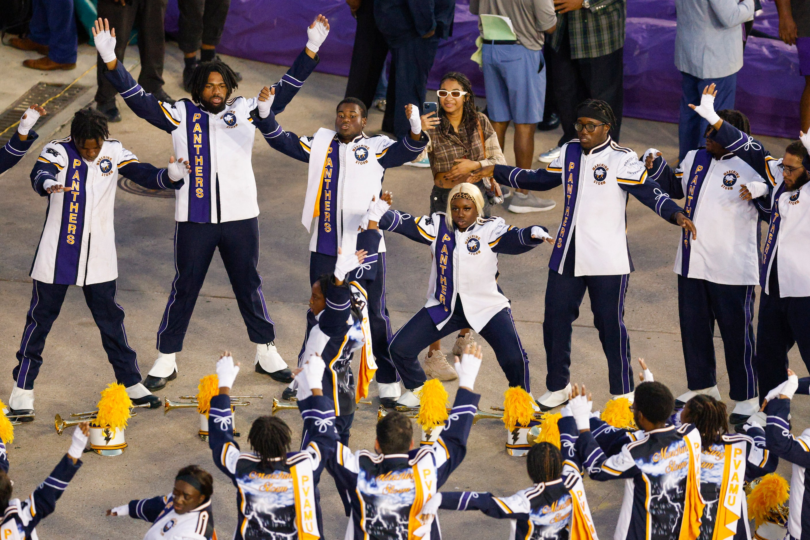 The Prairie View A&M marching band warms up before their halftime performance at the State...