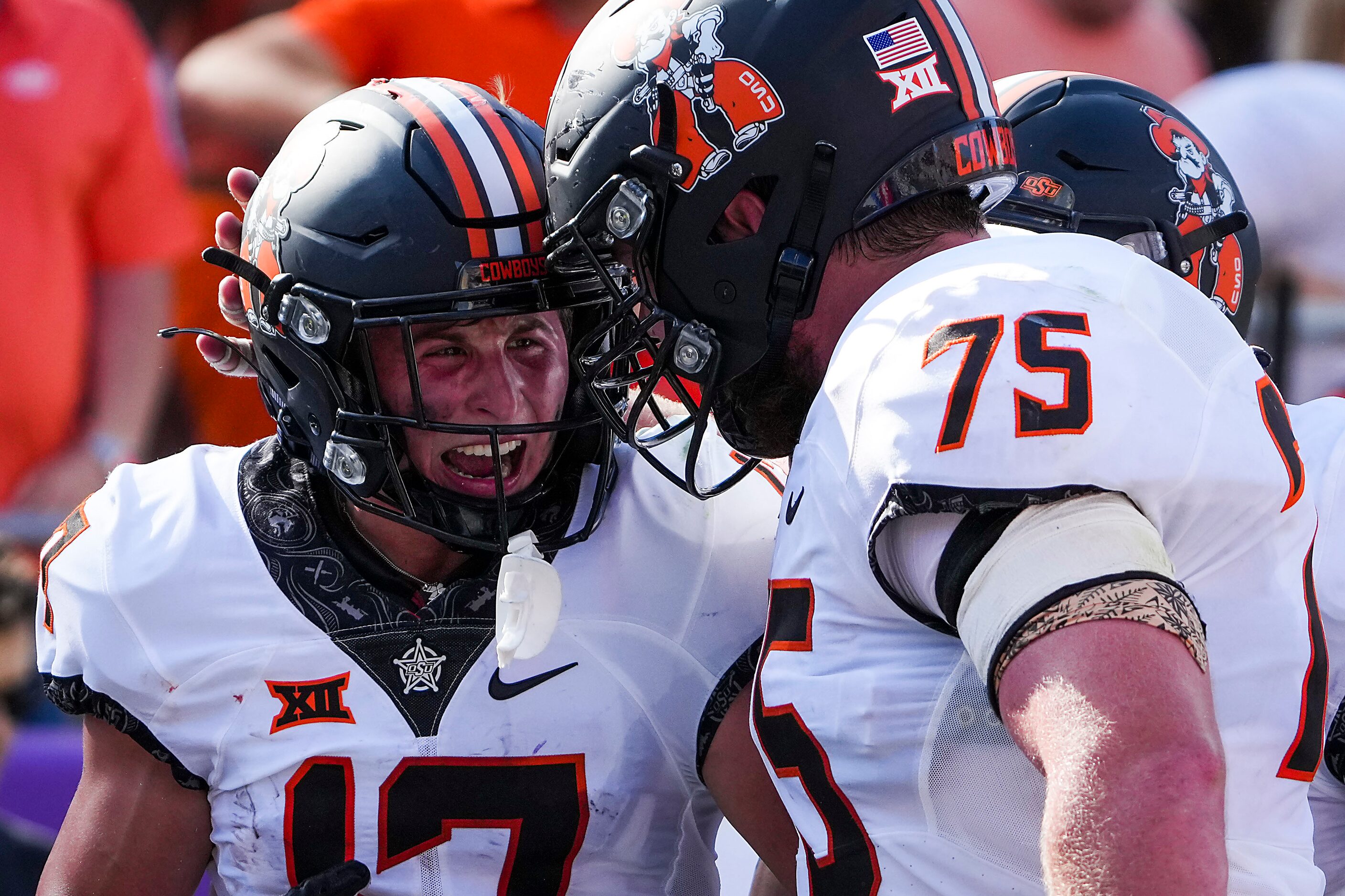 Oklahoma State wide receiver John Paul Richardson (17) celebrates after catching a touchdown...