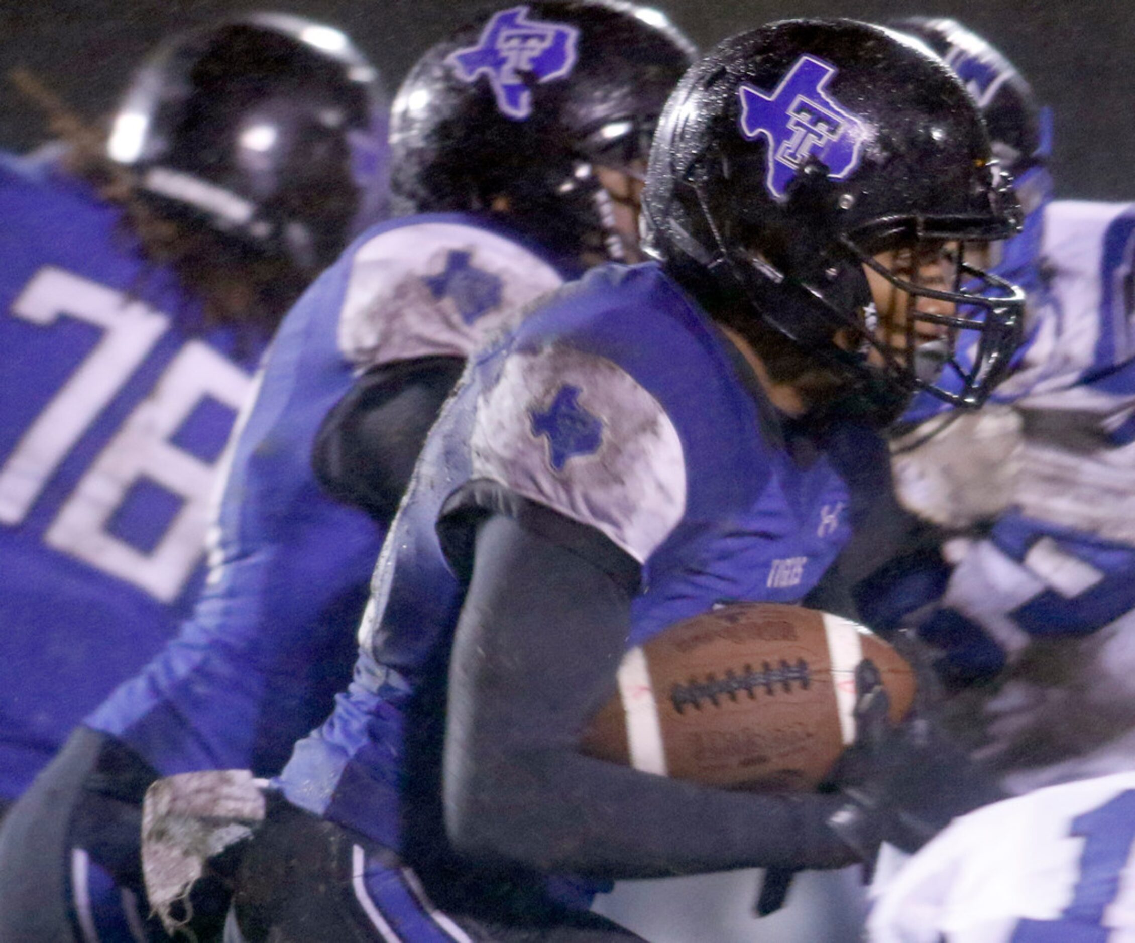 Trinity Christian-Cedar Hill running back Dez Moultrie (23) finds a running lane as he...