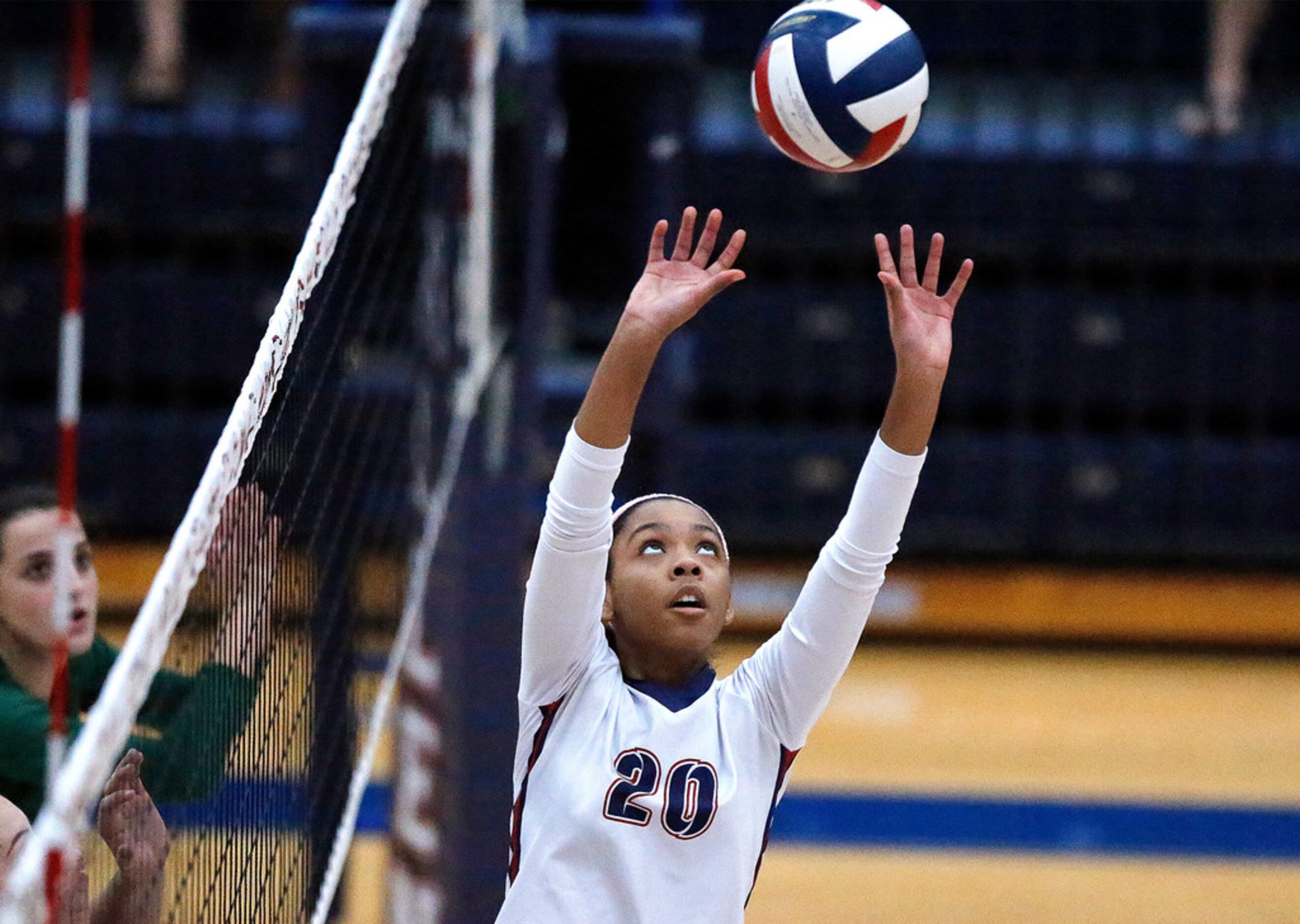 Allen High School setter Leah Reeves (20) makes a set during game one as Allen High School...