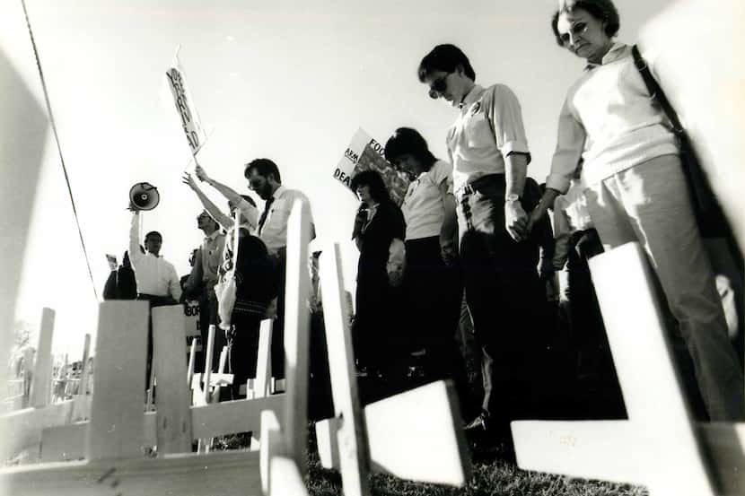 Jan. 19, 1986: Dallas Right To Life members pray outside Presbyterian Hospital. About 2,000...