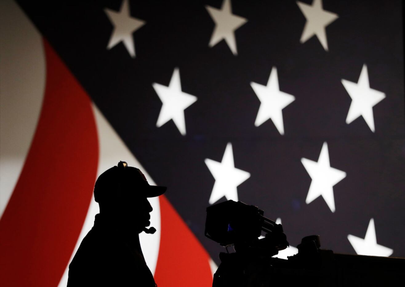 A TV cameraman sets up during rehearsals for the presidential debate between Democratic...