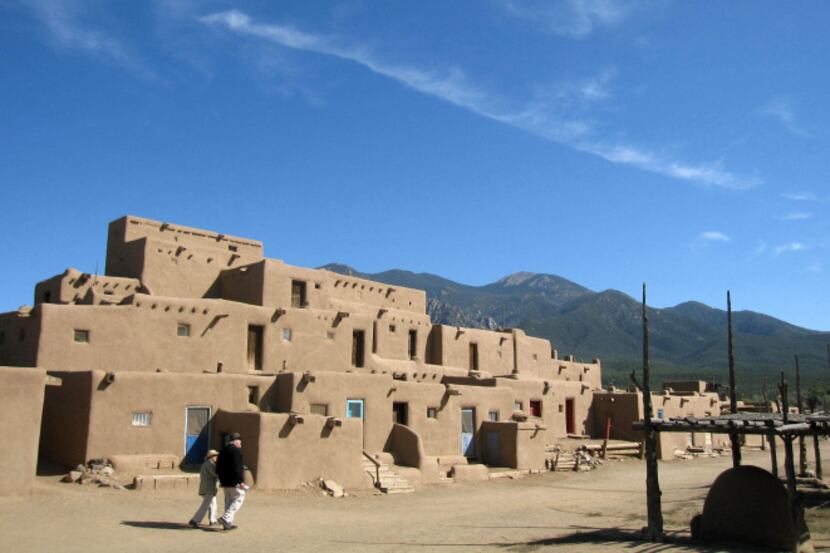 This October 2012 photo shows adobe dwellings at the Taos Pueblo in Taos, N.M., a UNESCO...