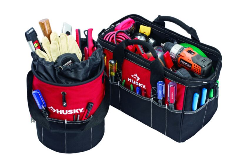 Constructed of heavy-duty, water-resistant material, the Husky 15-inch tool bag and utility...