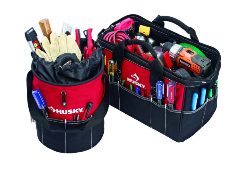 Constructed of heavy-duty, water-resistant material, the Husky 15-inch tool bag and utility...