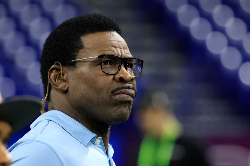 Michael Irvin of  NFL Network looks on during the NFL Combine at Lucas Oil Stadium on March...