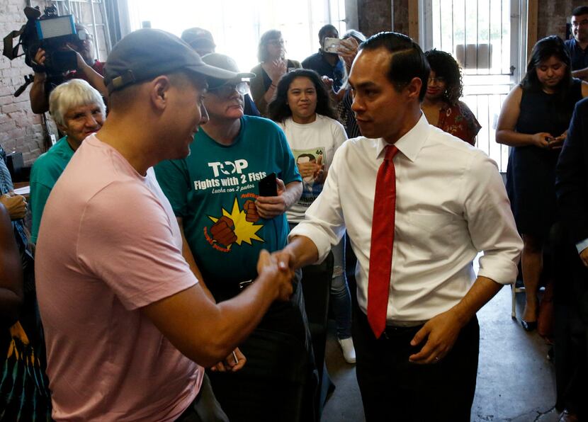 Democratic presidential hopeful Secretary Julian Castro greeted audience members before...