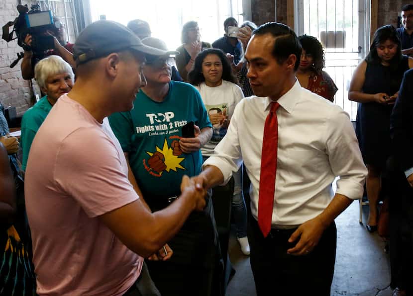 Democratic presidential hopeful Secretary Julian Castro greeted audience members before...
