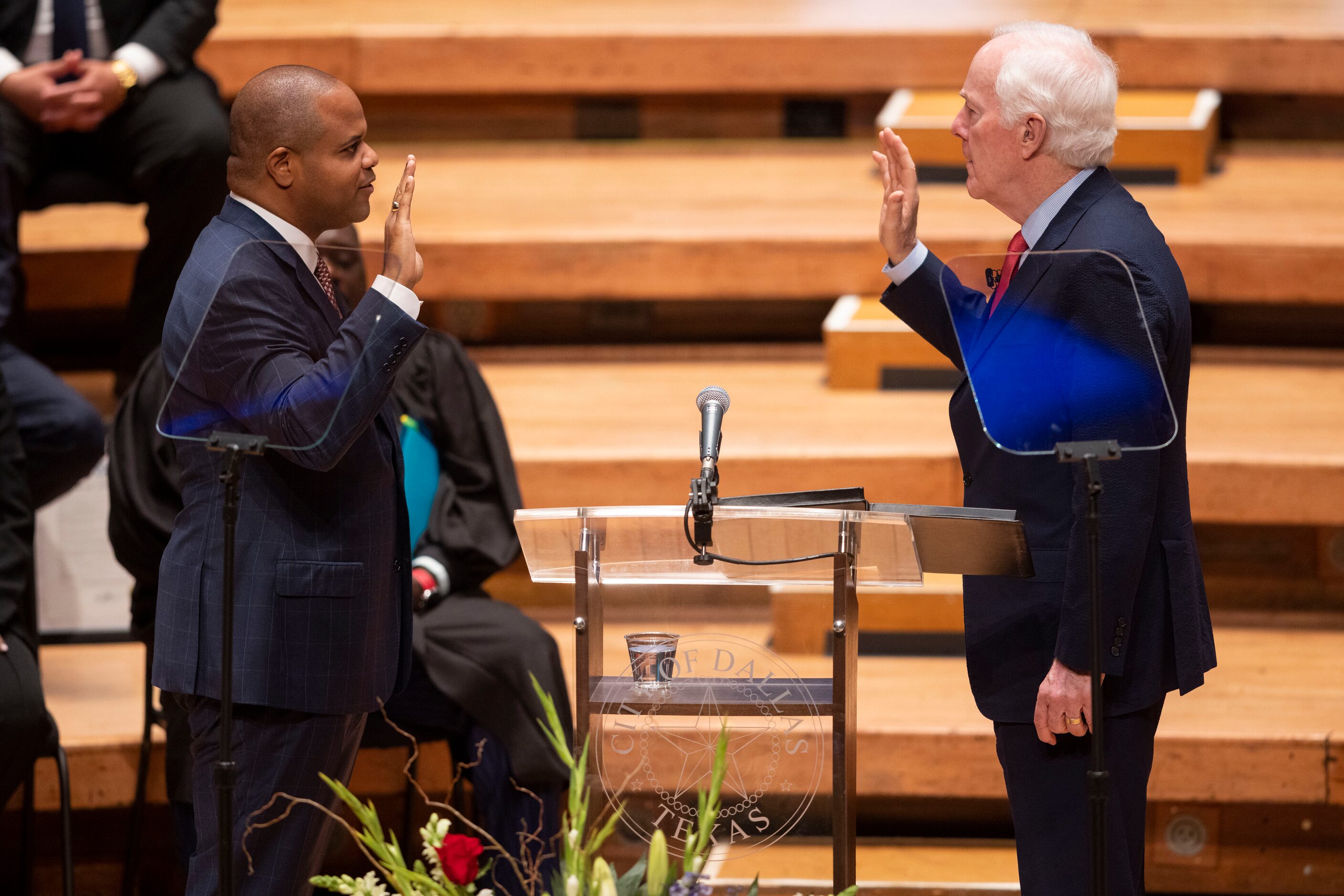 Dallas Mayor Eric Johnson takes the oath of office delivered by U.S. Sen. John Cornyn during...