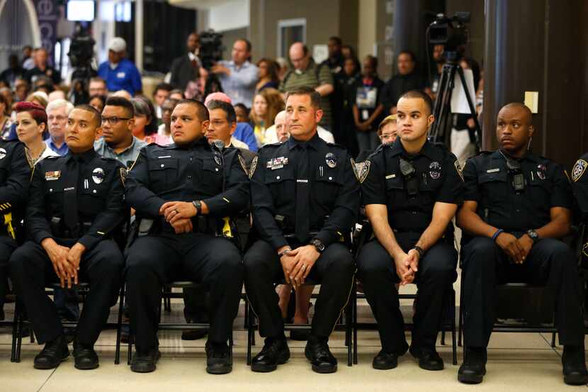 El Centro police officers sit in the front row during the Renewal and Resilience...
