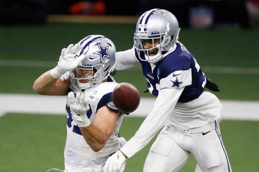 Dallas Cowboys cornerback Trevon Diggs (31) breaks up a pass intended for Dallas Cowboys...