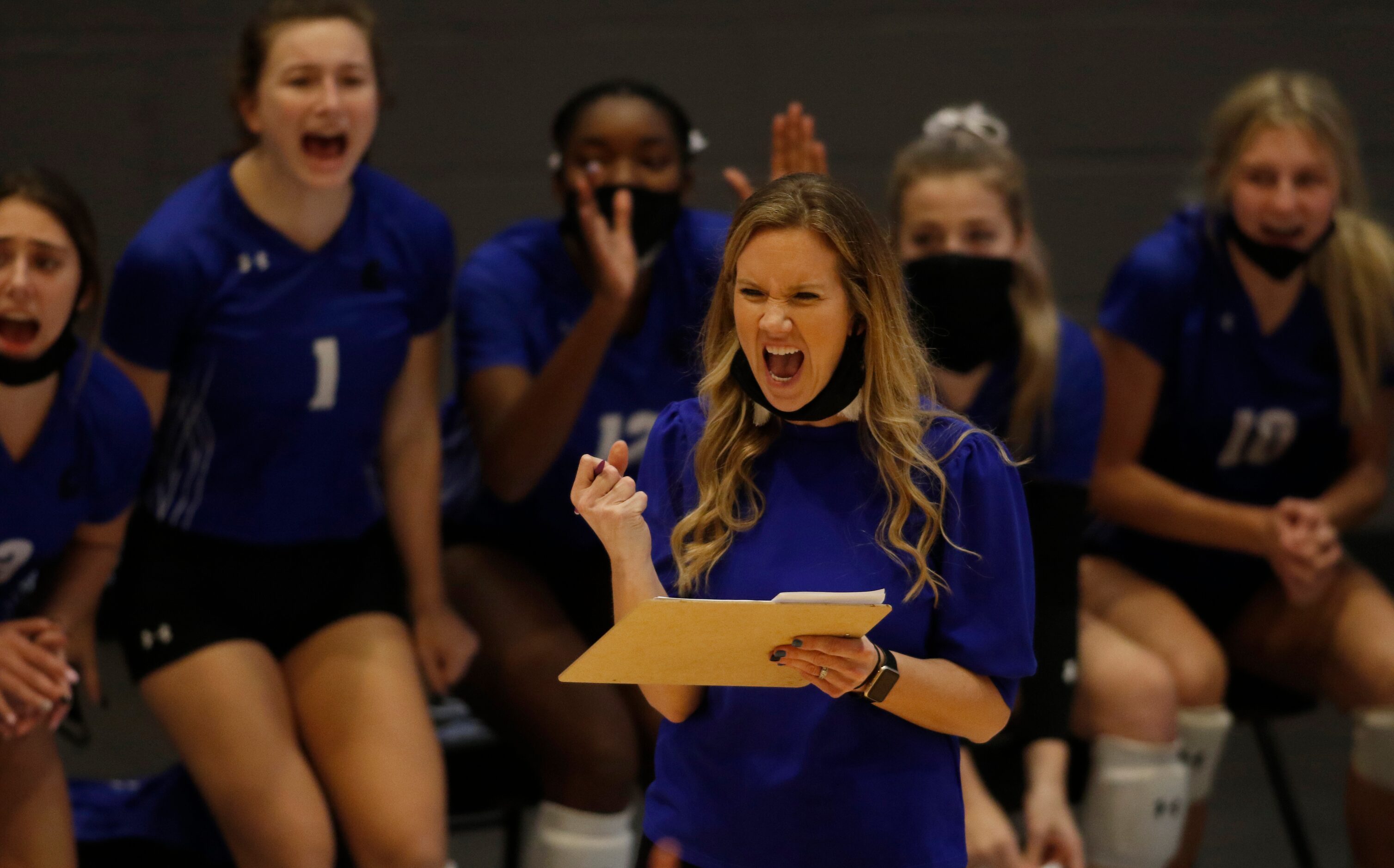 Denton Guyer head coach Heather Van Noy lets out a yell as euphoria erupts from the team...