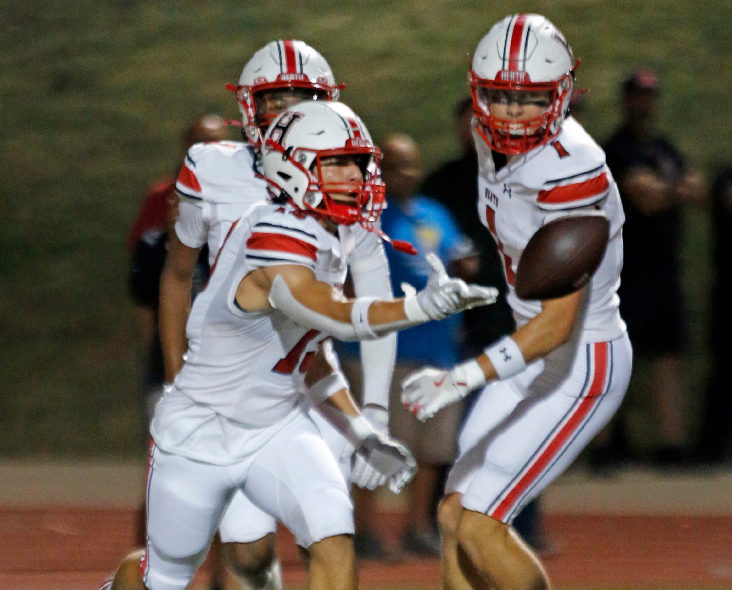 Rockwall Heath High WR Christian Contreas (13) celebrates in the end zone after the...